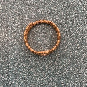 This is a Pandora Princess Tiara Crown Ring in yellow gold.